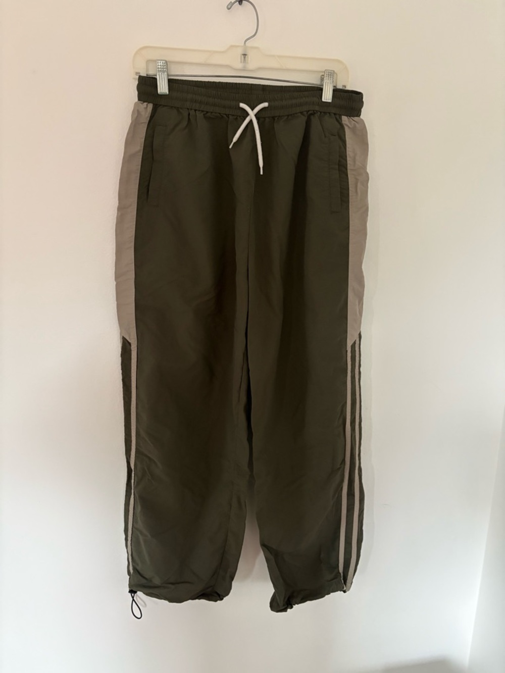 Aelfric Eden olive green striped track pants with drawstring cuffs